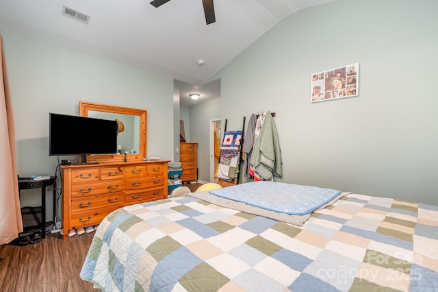 4703 David Cox Rd, Charlotte, NC 28269 - bedroom with lofted ceiling, wood finished floors, and ceiling fan