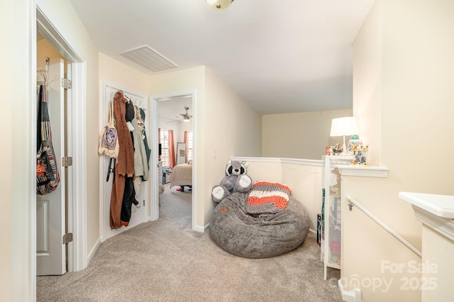 4703 David Cox Rd, Charlotte, NC 28269 - hall with carpet flooring and an upstairs landing