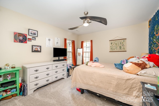 4703 David Cox Rd, Charlotte, NC 28269 - bedroom featuring light colored carpet and ceiling fan