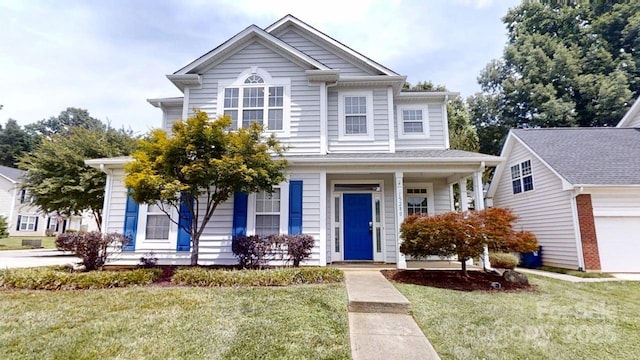 15280 Leslie Brook Rd, Huntersville, NC 28078 - traditional-style house featuring a front lawn and a garage