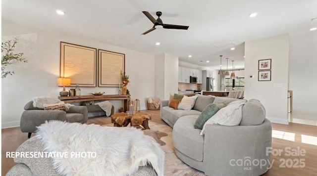 732 Falling Oak Aly Unit 22, Huntersville, NC 28078 - living area featuring ceiling fan, light wood-type flooring, and recessed lighting