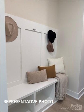 732 Falling Oak Aly Unit 22, Huntersville, NC 28078 - mudroom featuring wood finished floors and baseboards