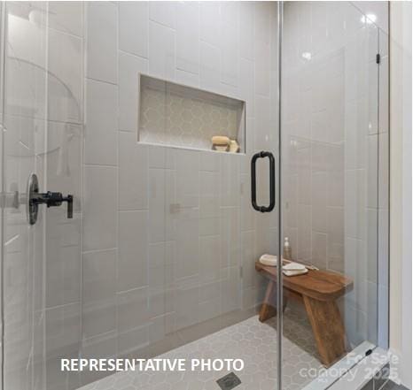 732 Falling Oak Aly Unit 22, Huntersville, NC 28078 - bathroom with a stall shower