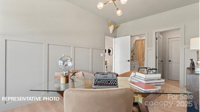 732 Falling Oak Aly Unit 22, Huntersville, NC 28078 - office space with a decorative wall, wood finished floors, and a chandelier