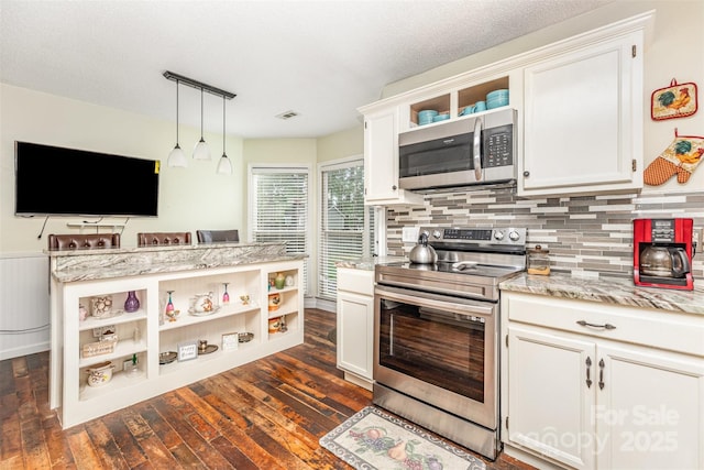 2133 Highland View Ln, Charlotte, NC 28214 - kitchen featuring open shelves, appliances with stainless steel finishes, dark wood-type flooring, backsplash, and white cabinets
