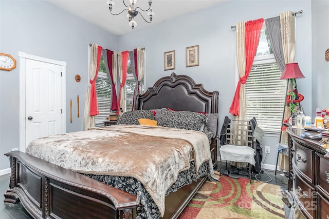 2133 Highland View Ln, Charlotte, NC 28214 - bedroom with a chandelier and baseboards