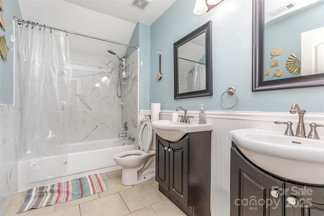 2133 Highland View Ln, Charlotte, NC 28214 - bathroom with shower / bath combo, vanity, a wainscoted wall, and tile patterned floors