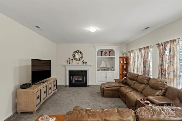 4966 Riverview Dr, Harrisburg, NC 28075 - living room featuring carpet flooring and a fireplace with flush hearth