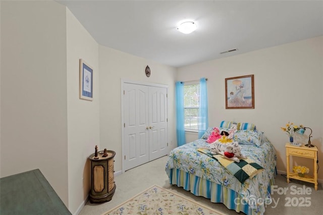 4966 Riverview Dr, Harrisburg, NC 28075 - carpeted bedroom with a closet and baseboards