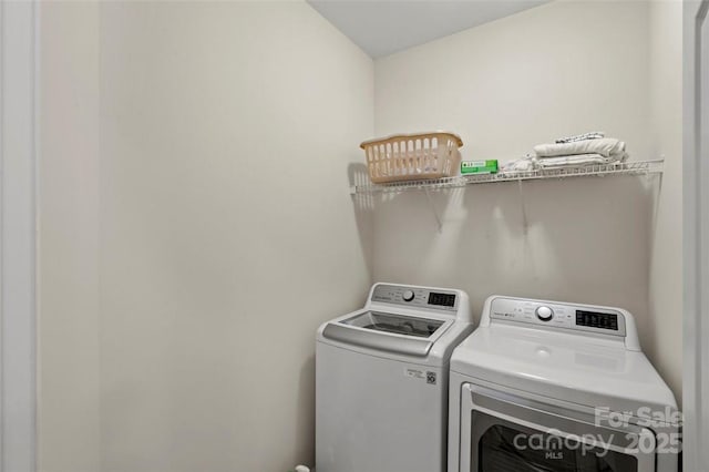 4966 Riverview Dr, Harrisburg, NC 28075 - laundry room featuring washing machine and clothes dryer