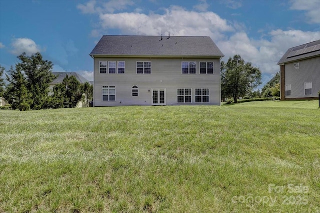 4966 Riverview Dr, Harrisburg, NC 28075 - rear view of property featuring a lawn