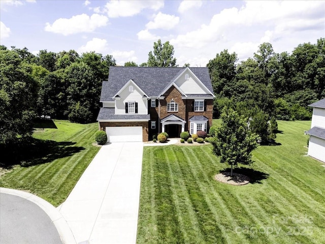 4966 Riverview Dr, Harrisburg, NC 28075 - view of front of home featuring a garage, concrete driveway, brick siding, and a front lawn