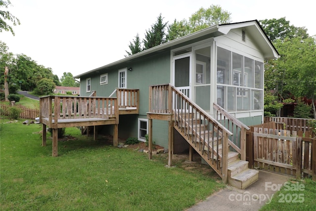9 Oakland St, Weaverville, NC 28787 - back of property with a deck, a sunroom, and stairs