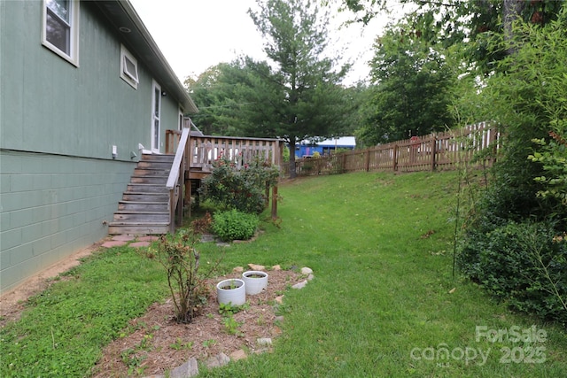 9 Oakland St, Weaverville, NC 28787 - fenced backyard with stairway and a deck