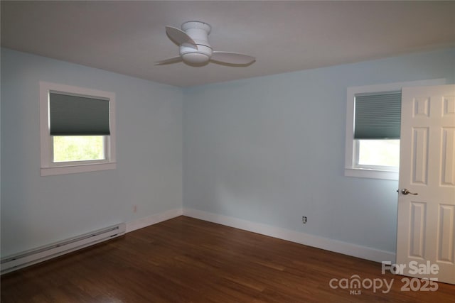 9 Oakland St, Weaverville, NC 28787 - spare room featuring a baseboard radiator, wood finished floors, and a ceiling fan