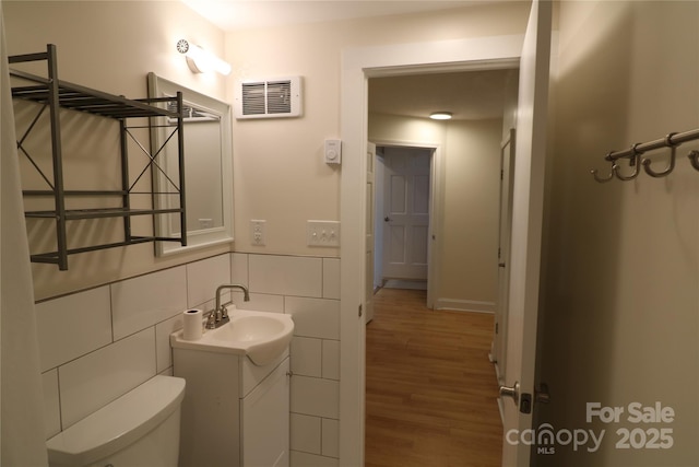 9 Oakland St, Weaverville, NC 28787 - bathroom with vanity, wood finished floors, and tile walls