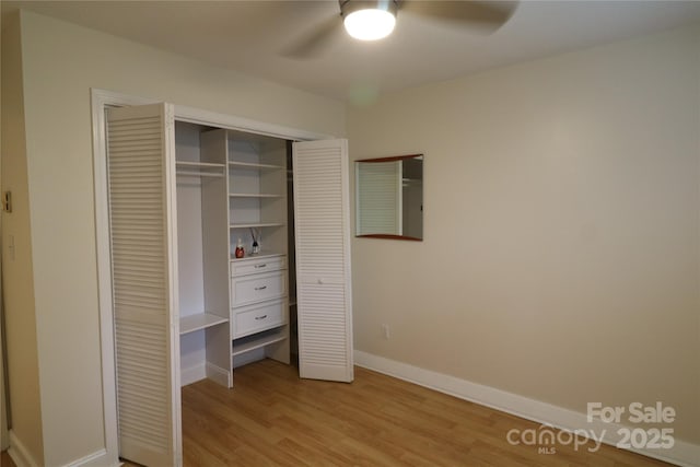 9 Oakland St, Weaverville, NC 28787 - unfurnished bedroom featuring light wood finished floors, a closet, and ceiling fan