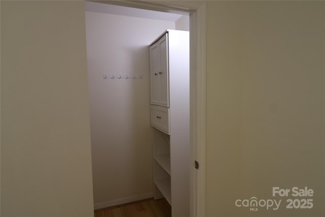 9 Oakland St, Weaverville, NC 28787 - hallway featuring wood finished floors and baseboards