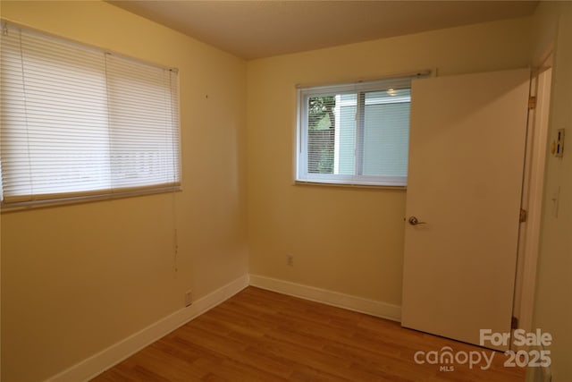 9 Oakland St, Weaverville, NC 28787 - unfurnished room featuring light wood finished floors and baseboards