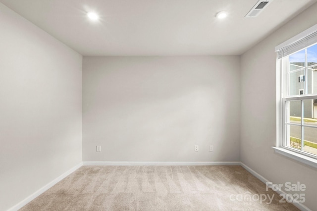 1204 May Apple Dr, Matthews, NC 28104 - unfurnished room with light carpet and recessed lighting