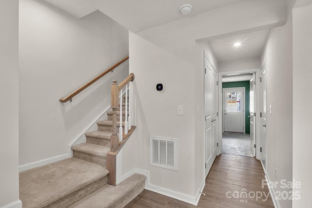 1204 May Apple Dr, Matthews, NC 28104 - staircase featuring wood finished floors and recessed lighting