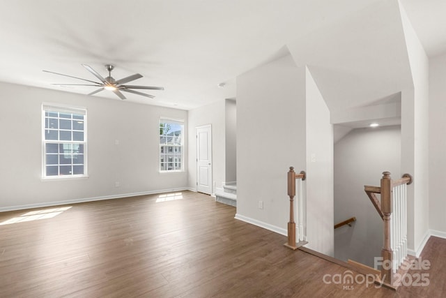 1204 May Apple Dr, Matthews, NC 28104 - spare room with wood finished floors and a ceiling fan
