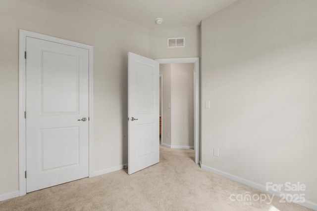 1204 May Apple Dr, Matthews, NC 28104 - unfurnished bedroom with carpet flooring and baseboards