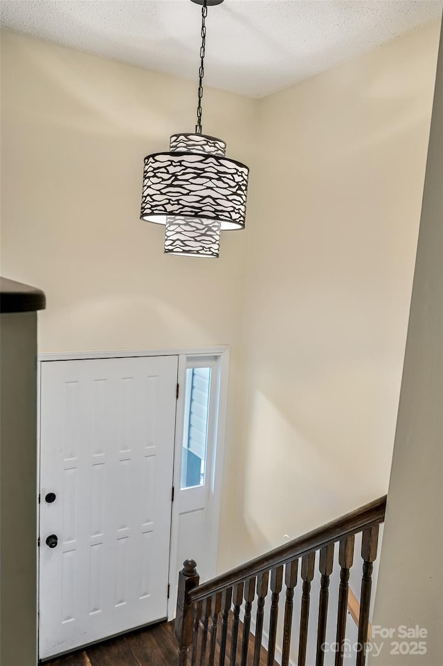 18 Golden Oaks Ln, Fletcher, NC 28732 - entrance foyer featuring dark wood-type flooring and a textured ceiling