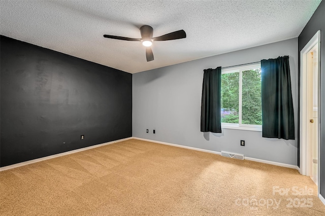 18 Golden Oaks Ln, Fletcher, NC 28732 - unfurnished room with carpet flooring, a ceiling fan, and a textured ceiling