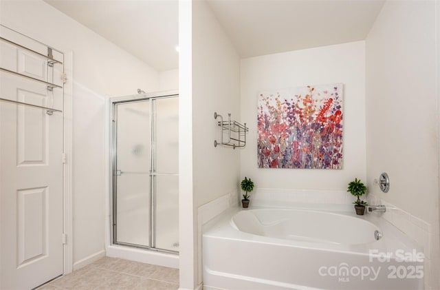 4068 Sherri Ln, Fort Mill, SC 29715 - bathroom with a garden tub, a stall shower, and tile patterned floors