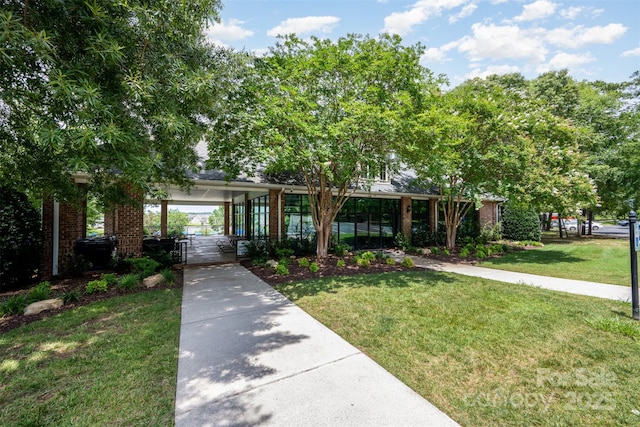 4068 Sherri Ln, Fort Mill, SC 29715 - obstructed view of property with a front lawn and brick siding
