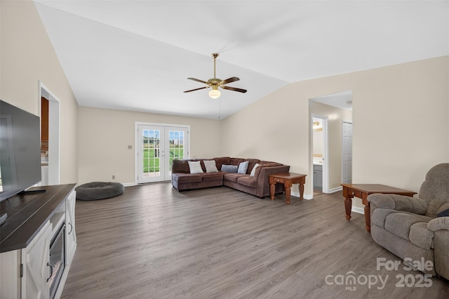 5445 Creekwood Dr, Salisbury, NC 28147 - living area with vaulted ceiling, wood finished floors, and a ceiling fan