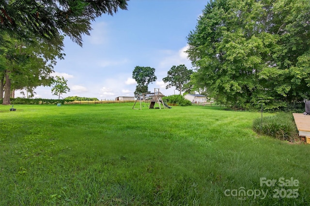 5445 Creekwood Dr, Salisbury, NC 28147 - view of grassy yard featuring a playground