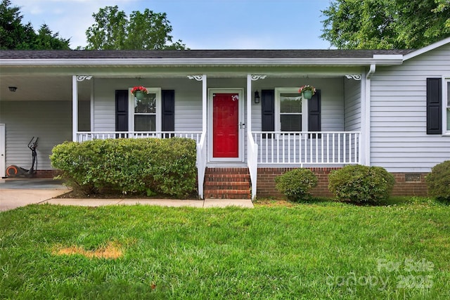 5445 Creekwood Dr, Salisbury, NC 28147 - view of front facade with covered porch, a front lawn, crawl space, a carport, and roof with shingles