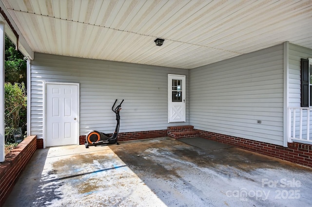 5445 Creekwood Dr, Salisbury, NC 28147 - view of patio featuring an attached carport and entry steps