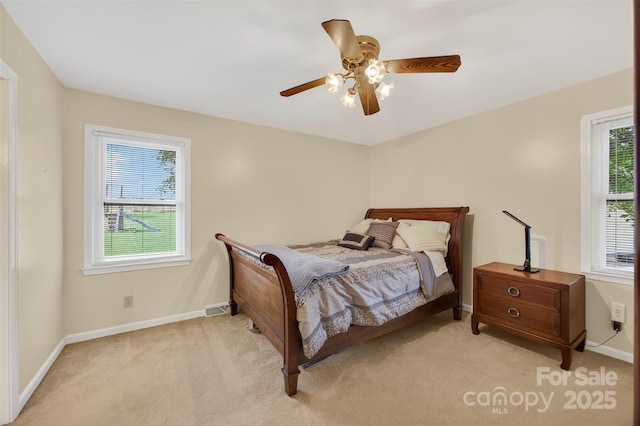 5445 Creekwood Dr, Salisbury, NC 28147 - bedroom with light carpet and a ceiling fan