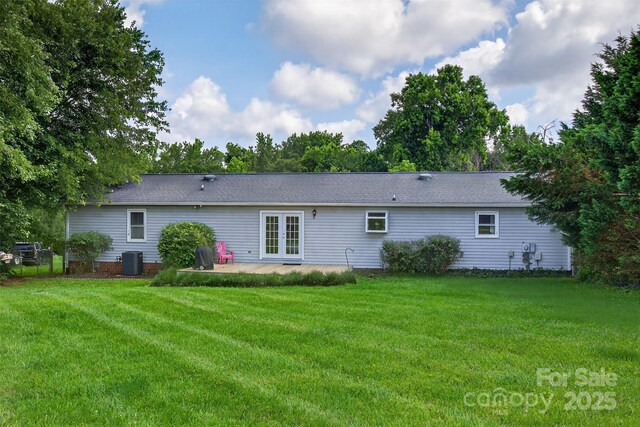 5445 Creekwood Dr, Salisbury, NC 28147 - back of house featuring french doors, a patio area, and a yard