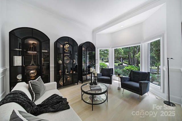 8016 Pemswood St, Charlotte, NC 28277 - sitting room featuring wood finished floors and crown molding