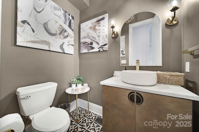 8016 Pemswood St, Charlotte, NC 28277 - half bath featuring vanity and tile patterned floors