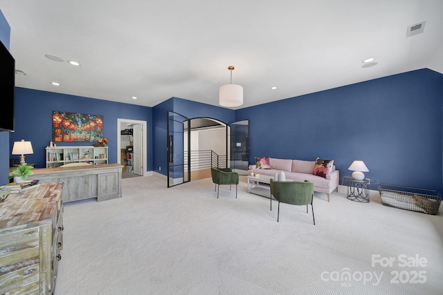 8016 Pemswood St, Charlotte, NC 28277 - carpeted living room featuring recessed lighting and arched walkways