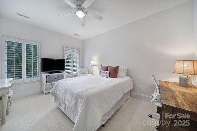 8016 Pemswood St, Charlotte, NC 28277 - carpeted bedroom with baseboards and ceiling fan