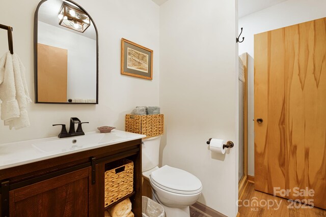 285 Fairway Loop Unit 7, Burnsville, NC 28714 - bathroom with wood finished floors and vanity