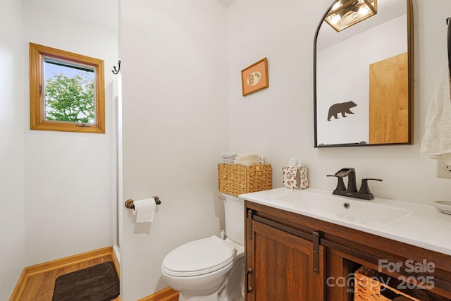285 Fairway Loop Unit 7, Burnsville, NC 28714 - bathroom with vanity and wood finished floors