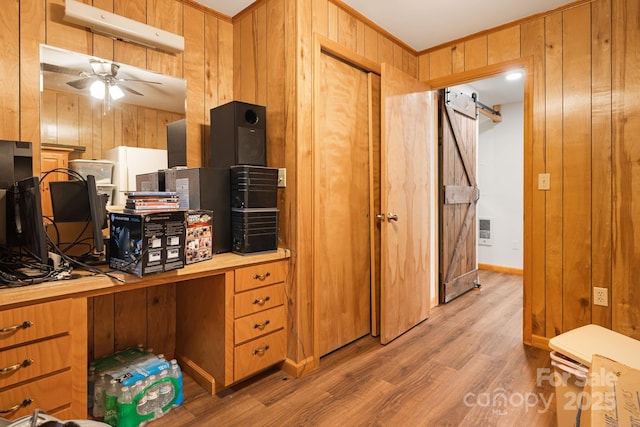 285 Fairway Loop Unit 7, Burnsville, NC 28714 - office space with wood walls, light wood-style flooring, and a ceiling fan