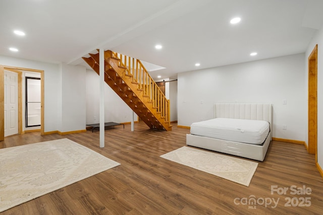 285 Fairway Loop Unit 7, Burnsville, NC 28714 - bedroom with wood finished floors and recessed lighting