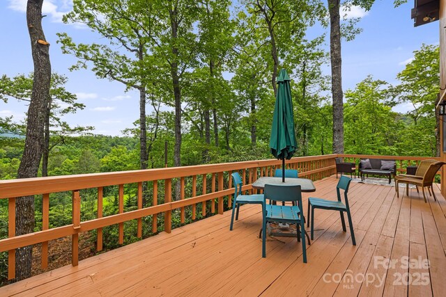 285 Fairway Loop Unit 7, Burnsville, NC 28714 - deck with outdoor dining space and an outdoor living space