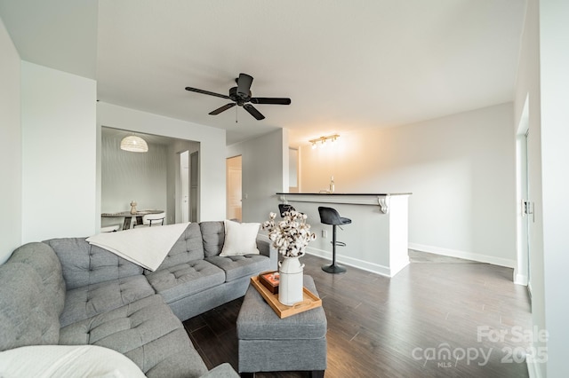 1315 E Blvd Unit 327, Charlotte, NC 28203 - living area featuring wood finished floors and a ceiling fan