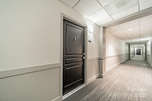 1315 E Blvd Unit 327, Charlotte, NC 28203 - corridor featuring a drop ceiling and carpet