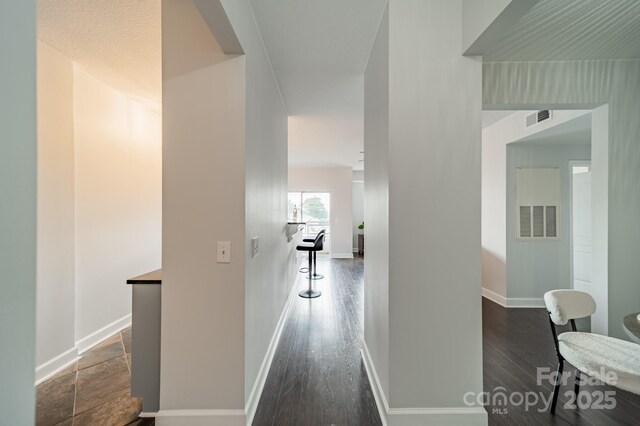 1315 E Blvd Unit 327, Charlotte, NC 28203 - hallway featuring wood finished floors