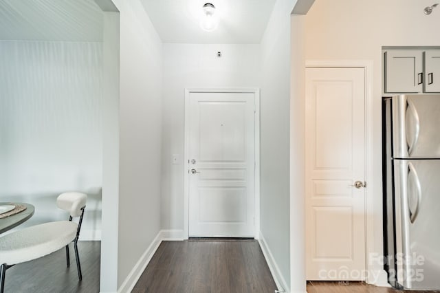 1315 E Blvd Unit 327, Charlotte, NC 28203 - doorway featuring dark wood-style flooring and baseboards
